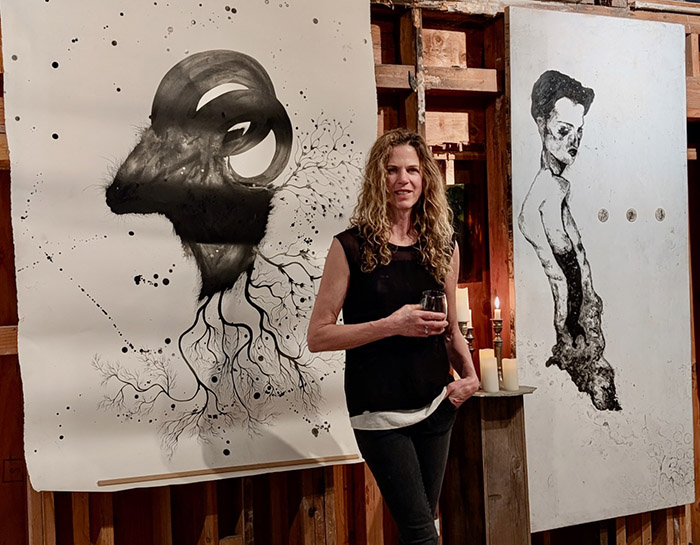 Woman and black & white paintings