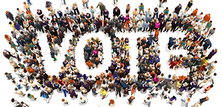 People making up VOTE sign